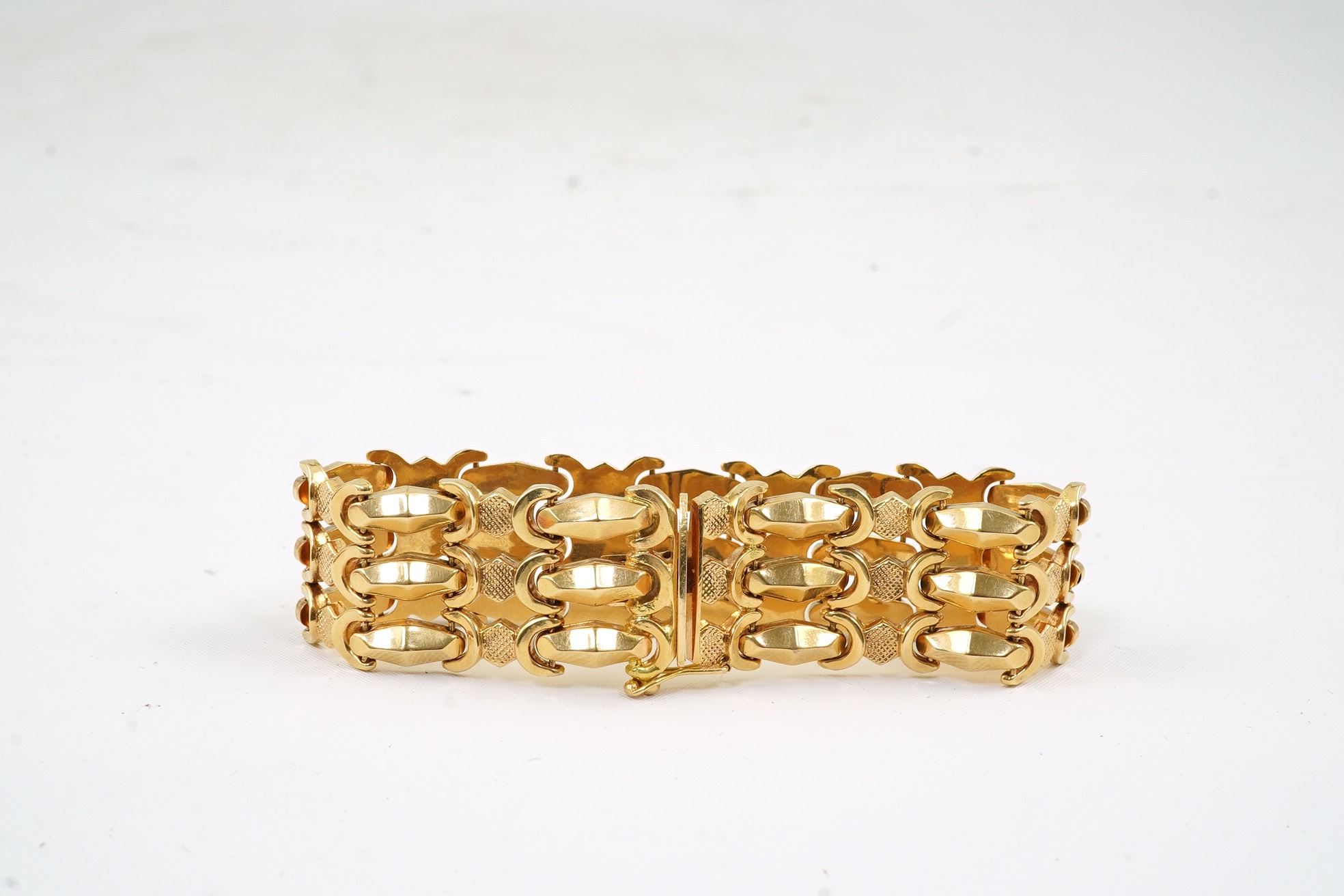 A modern Italian 18k gold bright cut and textured link bracelet